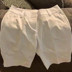 White women golf shorts. Brand new with tags